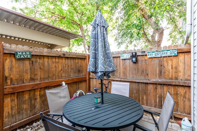 1977 S Oakland Way, Aurora, CO 80014 - view of patio / terrace with outdoor dining area