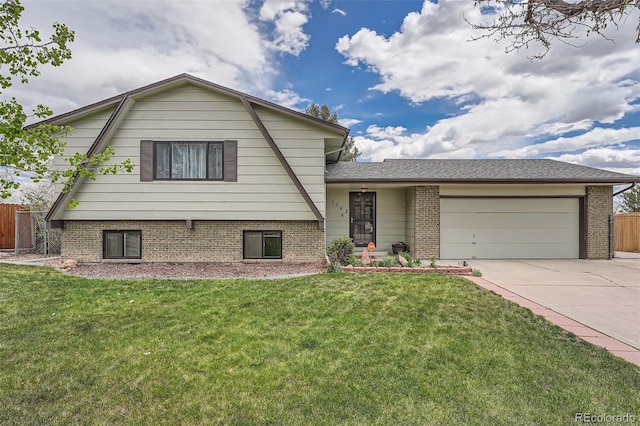 view of front of house with fence, a front yard, brick siding, an attached garage, and driveway