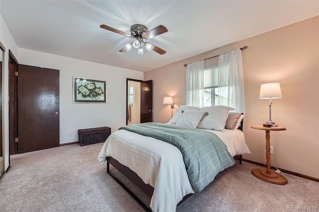 bedroom featuring baseboards, carpet, and ceiling fan