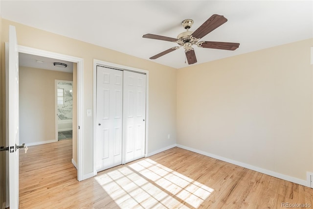5384 S Datura St, Littleton, CO 80120 - unfurnished bedroom featuring light wood-style floors, a closet, and ceiling fan