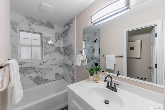 5384 S Datura St, Littleton, CO 80120 - bathroom featuring vanity and washtub / shower combination