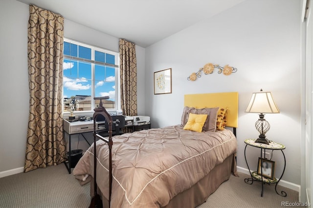 carpeted bedroom with baseboards