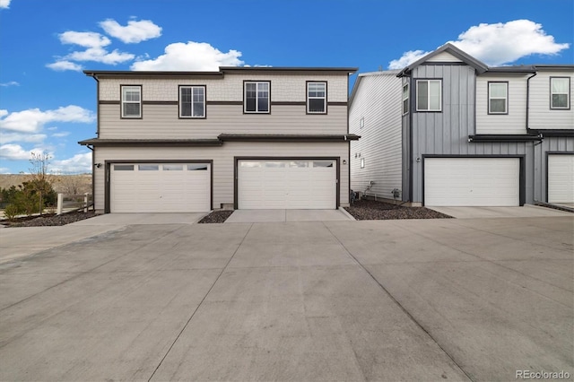 view of front of property with an attached garage and driveway