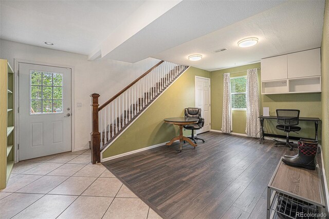 9075 Jill Dr, Conifer, CO 80433 - entryway featuring stairs and light wood-style floors