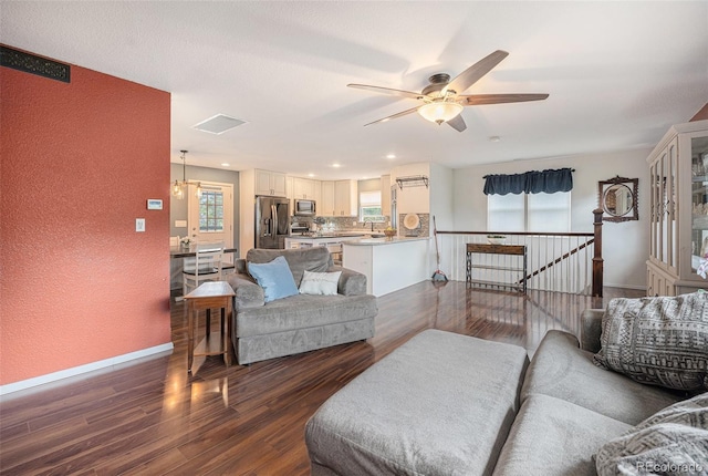 9075 Jill Dr, Conifer, CO 80433 - living area featuring dark wood-style floors, a ceiling fan, recessed lighting, and a textured wall