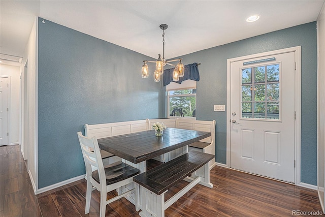 9075 Jill Dr, Conifer, CO 80433 - dining area with a textured wall, dark wood-style floors, a chandelier, and recessed lighting