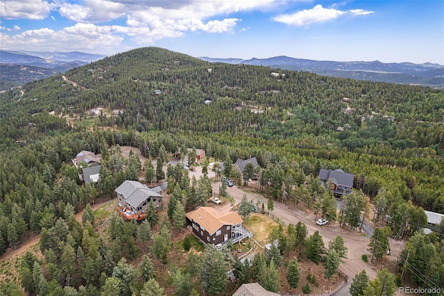 9075 Jill Dr, Conifer, CO 80433 - view of property location featuring a forest and a mountain backdrop