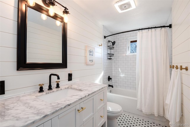 6361 S Spotswood Cir, Littleton, CO 80120 - bathroom featuring vanity, shower / tub combo, tile patterned floors, and wooden walls
