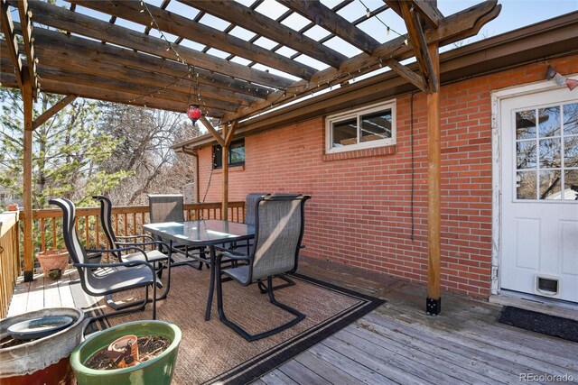 6361 S Spotswood Cir, Littleton, CO 80120 - wooden deck featuring outdoor dining space and a pergola