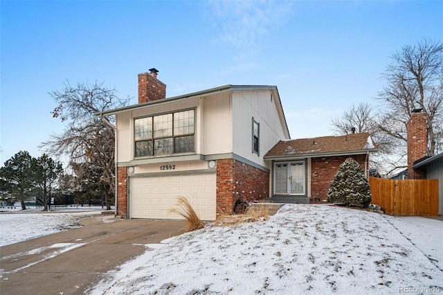 view of front of property with a garage