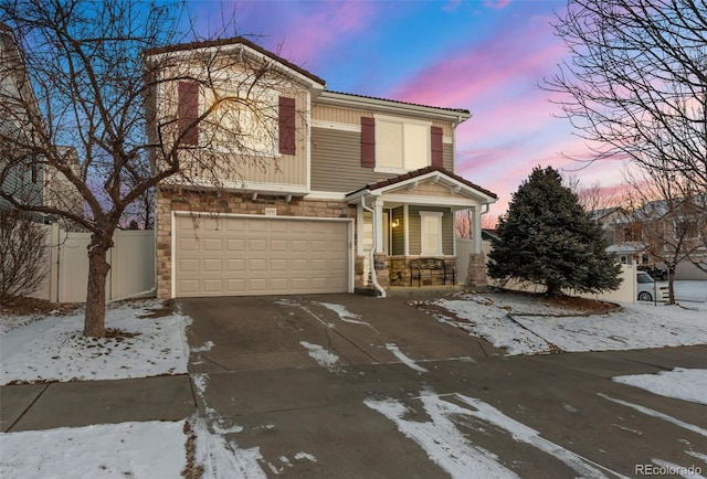 view of front of property with a garage