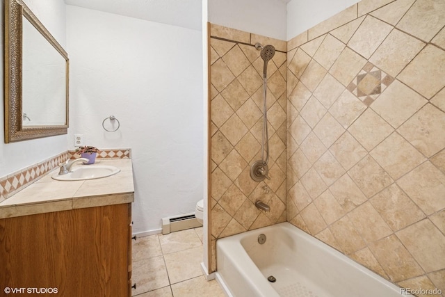 22081 Paradise Cir, Golden, CO 80401 - full bath featuring baseboard heating, tile patterned floors, shower / washtub combination, vanity, and toilet