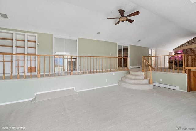 22081 Paradise Cir, Golden, CO 80401 - spare room with baseboard heating, a baseboard radiator, a ceiling fan, lofted ceiling, and carpet
