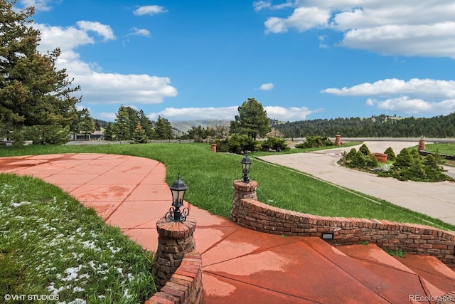 22081 Paradise Cir, Golden, CO 80401 - surrounding community featuring a lawn