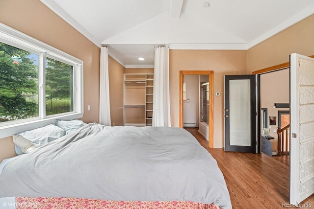 22081 Paradise Cir, Golden, CO 80401 - bedroom featuring wood finished floors and a spacious closet