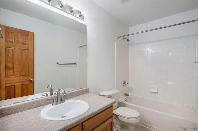 full bathroom featuring vanity, toilet, and washtub / shower combination