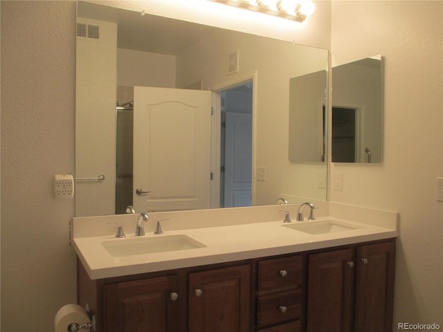 2239 Calais Dr Unit E, Longmont, CO 80504 - bathroom featuring double vanity