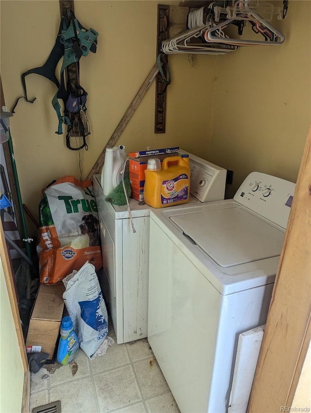 laundry room with washer and dryer