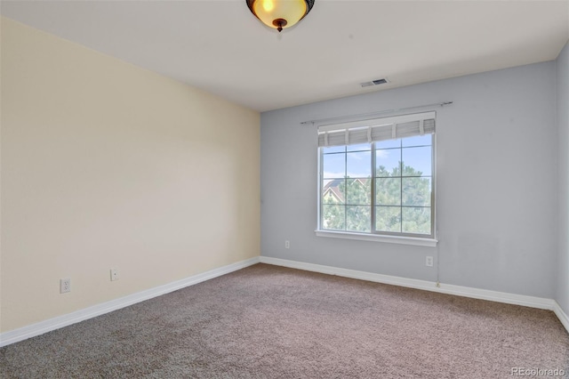 view of carpeted spare room