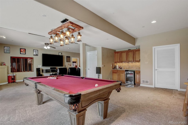 playroom with billiards, ceiling fan, bar, wine cooler, and light colored carpet