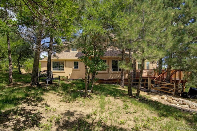 view of yard featuring a deck