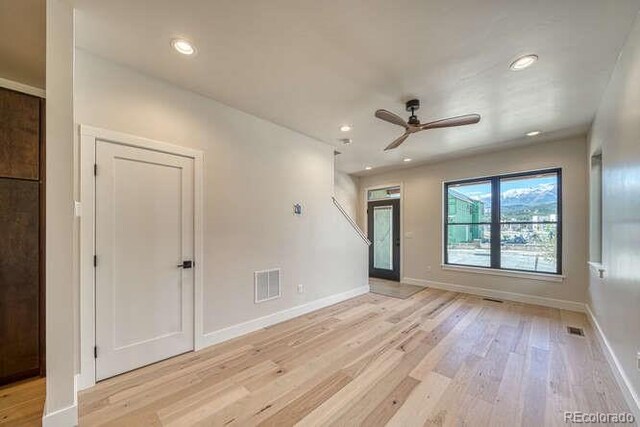 136 Chase St, Salida, CO 81201 - spare room with light wood-type flooring, a ceiling fan, recessed lighting, and baseboards