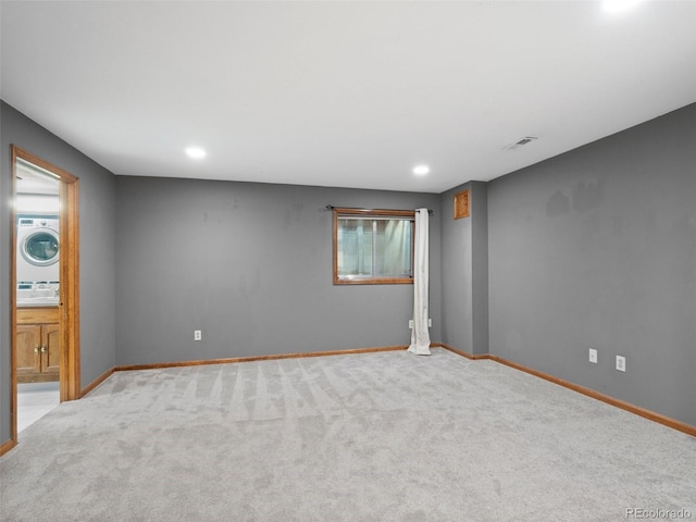 carpeted spare room with baseboards, visible vents, and recessed lighting