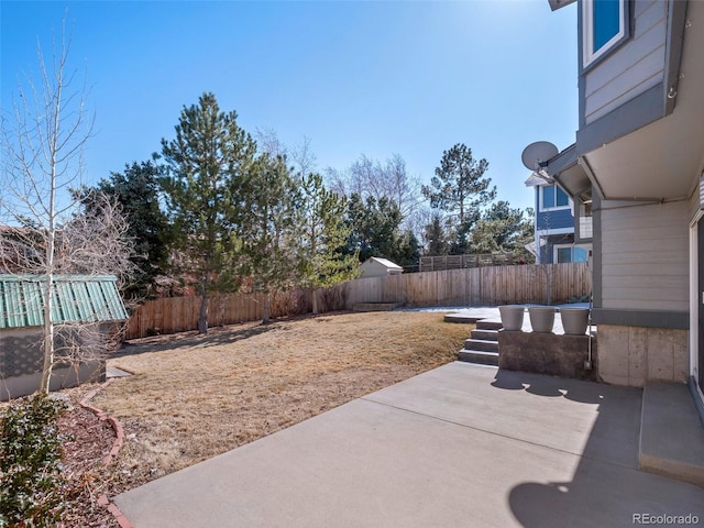 view of patio with a fenced backyard