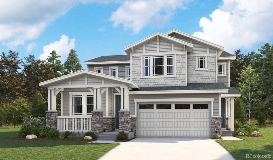 craftsman house featuring covered porch, a garage, and a front lawn