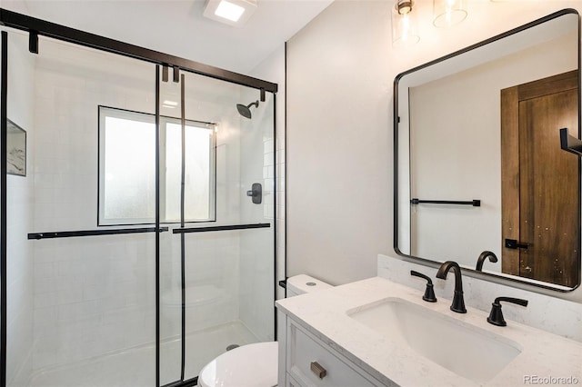 5100 Clay St, Denver, CO 80221 - bathroom featuring toilet, a stall shower, and vanity