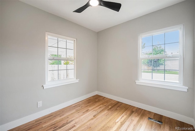5100 Clay St, Denver, CO 80221 - empty room featuring plenty of natural light, baseboards, wood finished floors, and ceiling fan