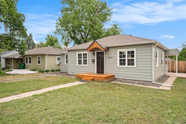 5100 Clay St, Denver, CO 80221 - view of front of home with a patio area and roof with shingles