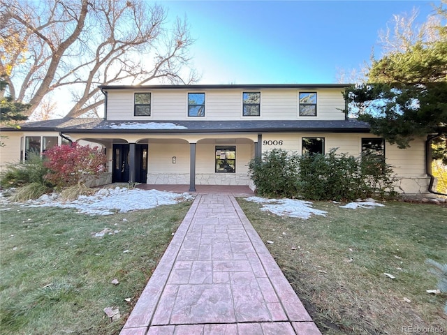 front of property featuring a front yard