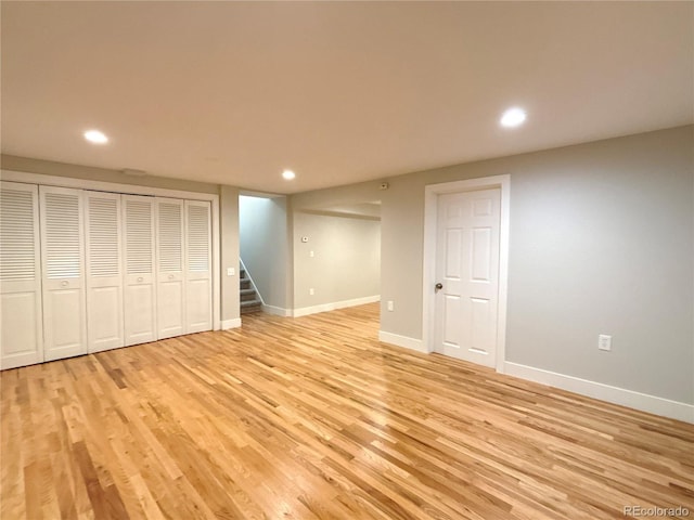 basement featuring light hardwood / wood-style floors