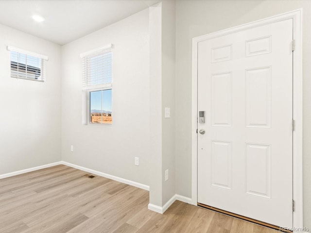 entrance foyer with light wood-type flooring