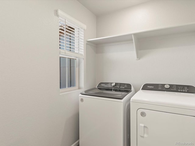 laundry area featuring independent washer and dryer