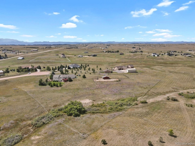 aerial view with a rural view and a mountain view