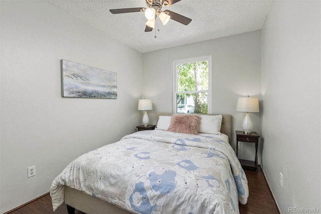 8260 Washington St Unit 78, Denver, CO 80229 - bedroom with a textured ceiling, wood finished floors, and ceiling fan