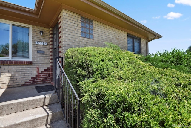 10595 E 23rd Ave, Aurora, CO 80010 - view of property exterior with brick siding