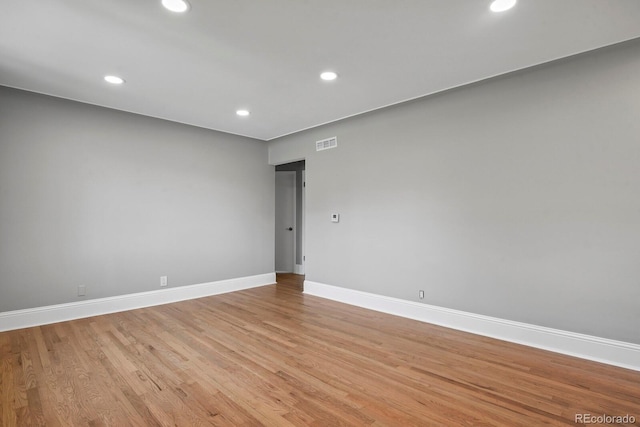 10595 E 23rd Ave, Aurora, CO 80010 - spare room with recessed lighting and light wood finished floors