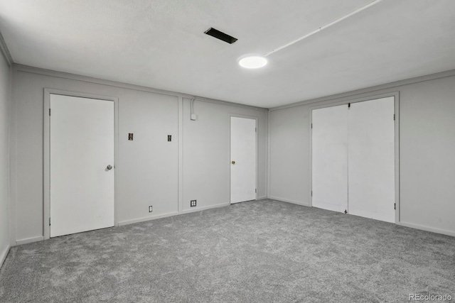 10595 E 23rd Ave, Aurora, CO 80010 - unfurnished bedroom featuring carpet flooring