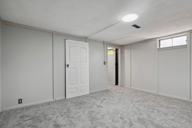10595 E 23rd Ave, Aurora, CO 80010 - below grade area with carpet flooring and plenty of natural light