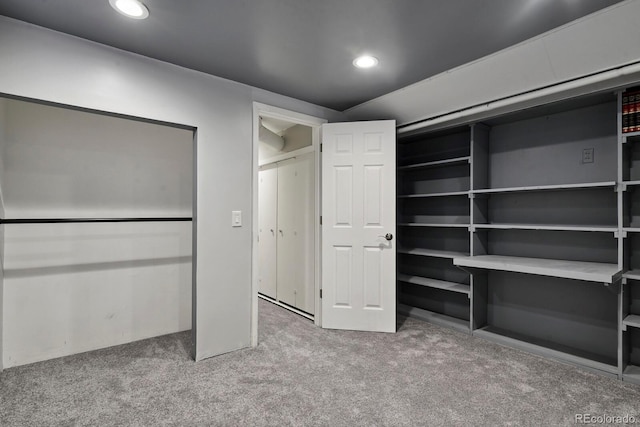 10595 E 23rd Ave, Aurora, CO 80010 - unfurnished bedroom featuring carpet floors and recessed lighting