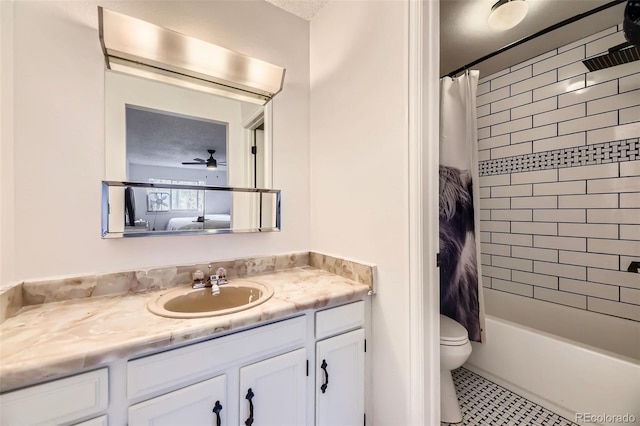 4934 S Flower Way, Littleton, CO 80123 - full bath with toilet, vanity, ceiling fan, shower / bathtub combination with curtain, and tile patterned flooring