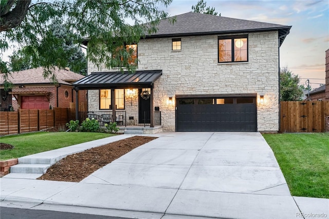 1157 Jersey St, Denver, CO 80220 - view of front of home with stone siding, concrete driveway, a garage, a standing seam roof, and roof with shingles