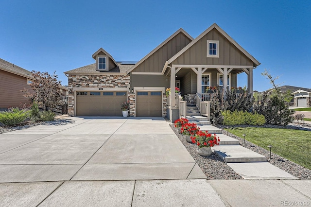 craftsman-style house with a front yard and covered porch