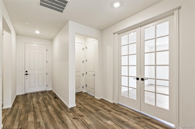 interior space featuring dark wood-type flooring and french doors