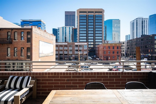 balcony featuring a city view