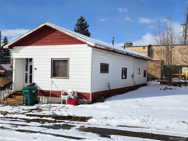 view of snow covered property