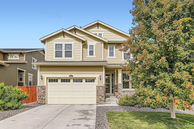 14067 Hudson St, Thornton, CO 80602 - craftsman-style home with an attached garage, stone siding, and driveway